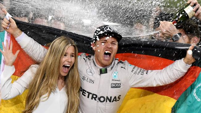 Nico Rosberg celebrates winning the 2016 F1 world championship with wife Vivian.