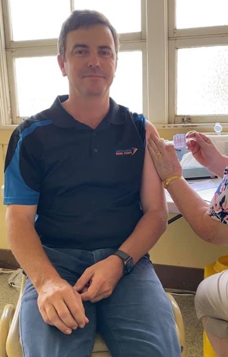 Barcaldine Mayor Sean Dillon receives his vaccination in March. (Facebook image)