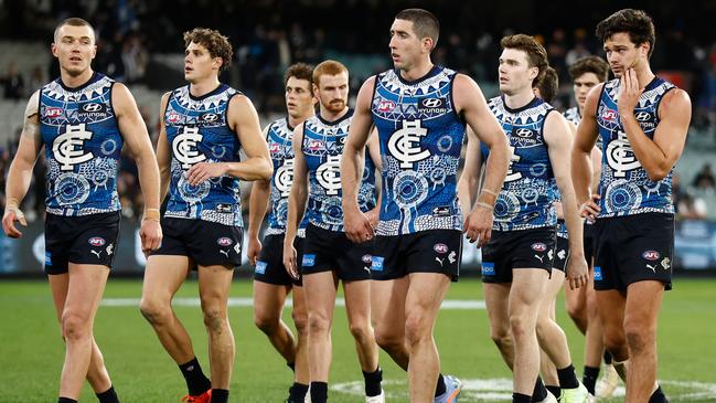 Carlton players look dejected after their loss to Collingwood. Picture: Getty Images