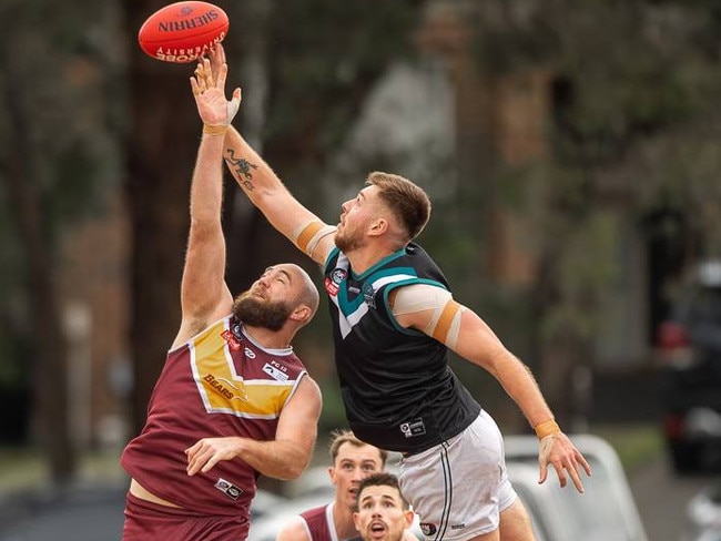 Patrick Flynn contests the ruck for Lower Plenty. Picture: Field of View Photography