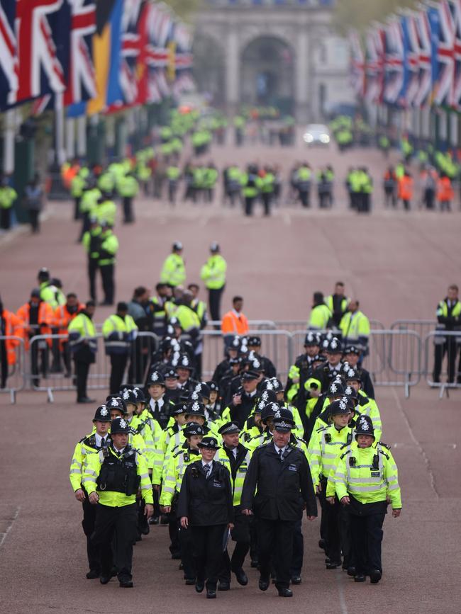 Metropolitan Police officers arriving on The Mall ahead of the Coronation of King Charles III.