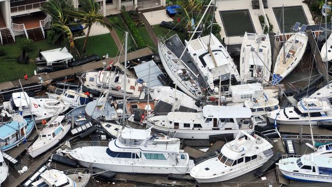 Ten year anniversary of Cyclone Yasi. Severe Tropical Cyclone Yasi 2011. Port Hinchinbrook aerial view of luxury yachts and boats that bore the brunt of the destructive winds and storm surge. Picture: Evan Morgan
