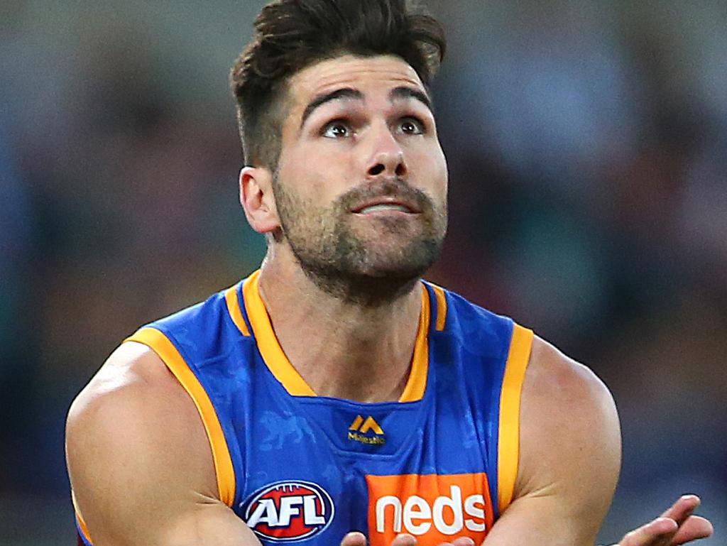 BRISBANE, AUSTRALIA - AUGUST 10: Marcus Adams of the Lions marks the ball during the round 21 AFL match between the Brisbane Lions and the Gold Coast Suns at The Gabba on August 10, 2019 in Brisbane, Australia. (Photo by Jono Searle/AFL Photos via Getty Images)