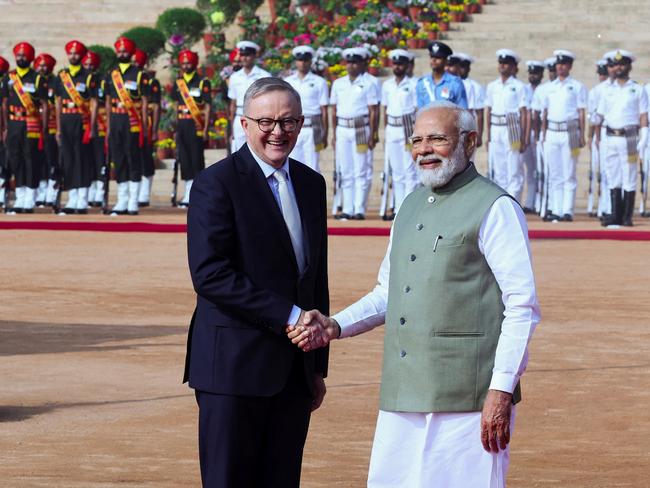 Anthony Albanese shakes hands with his Indian counterpart Narendra Modi during his ceremonial reception at the forecourt of India's Rashtrapati Bhavan Presidential Palace in New Delhi, India, March 10, 2023. REUTERS/Altaf Hussain