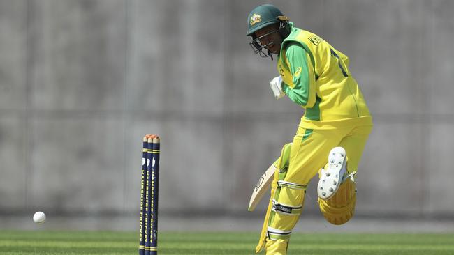 Usman Khawaja can’t get out of the way of the Andre Russell lifter.