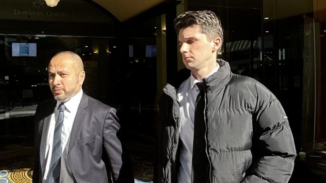 Luke Schofield with his lawyer at Downing Centre Local Court on Tuesday.