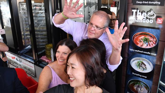 Prime Minister Scott Morrison unleashes ‘dorky dad’ with wife Jenny at a Strathfield shopping strip in Sydney. Picture: AAP Image/Mick Tsikas