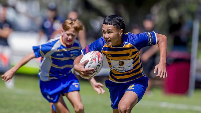 Day One of King of the Country rugby tournament at James Overell Park, Southport. possible. Sunshine Coast Invitational Barbarians U13s (Blue/yellow with ball) v USQ Saints U13s. Picture: Jerad Williams