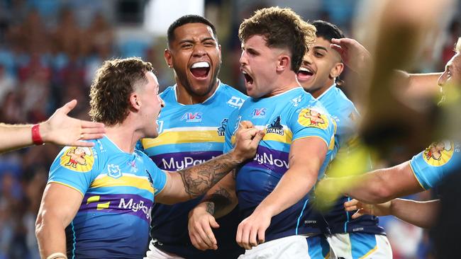 Toby Sexton of the Titans celebrates a tryduring the round six NRL match between Gold Coast Titans and St George Illawarra Dragons at Cbus Super Stadium on April 09, 2023 in Gold Coast, Australia. (Photo by Chris Hyde/Getty Images)