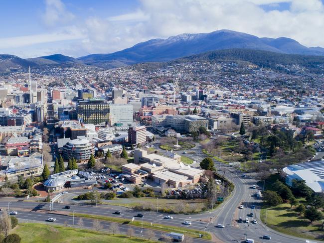 Hobart aerial showing new Remembrance Bridge, ABC ( Railway ) roundabout and the CBD. Mt Wellington with snow. Menzies / Macquarie Street / File / Generic / Drone