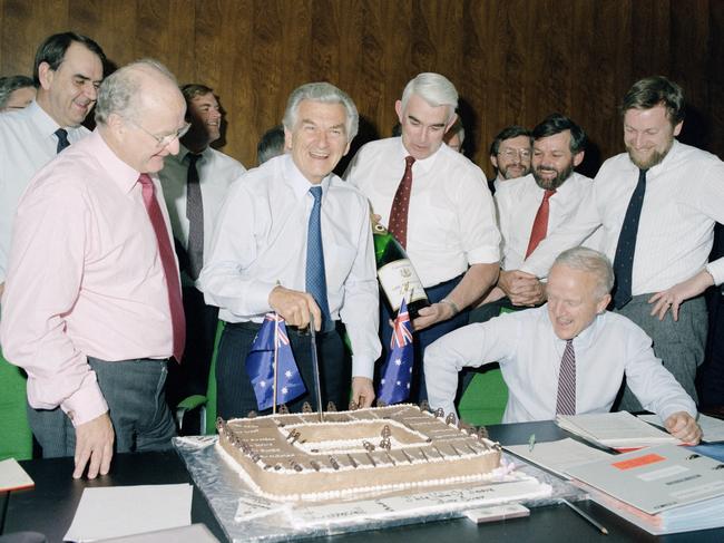 Prime Minister Bob Hawke with staff at the last Cabinet meeting in the old Cabinet Room, 1988.