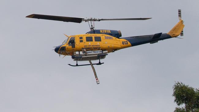 A RFS helicopter and drones will be deployed to assist firefighters on the ground. Picture: NCA NewsWire / James Gourley