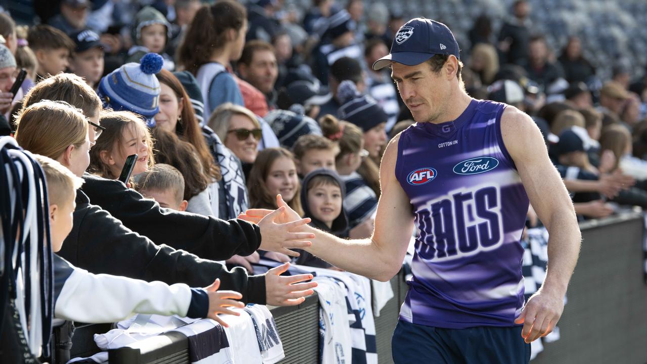 Cameron getting around to Cats fans at training on Monday. Picture: Brad Fleet