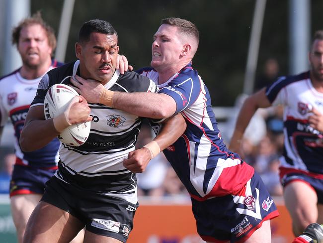 Runaway Bay’s John Mackin (right). Picture: Glenn Hampson