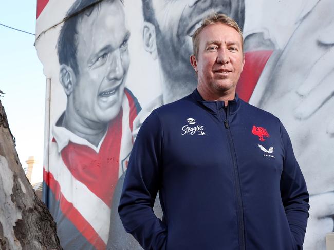 Pictured is Sydney Roosters coach Trent Robinson at club legends mural at Bondi Junction which now includes a portrait of retiring Sydney Roosters co-captain Jake Friend.Picture: Richard Dobson