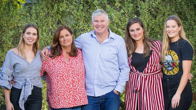 Former Australian rules footballer, coach and football commentator Danny Frawley speaks with Hamish McLachlan. Danny with wife Anita and daughters L to R Danielle, Chelsea and Keeley. Picture: Mark Stewart