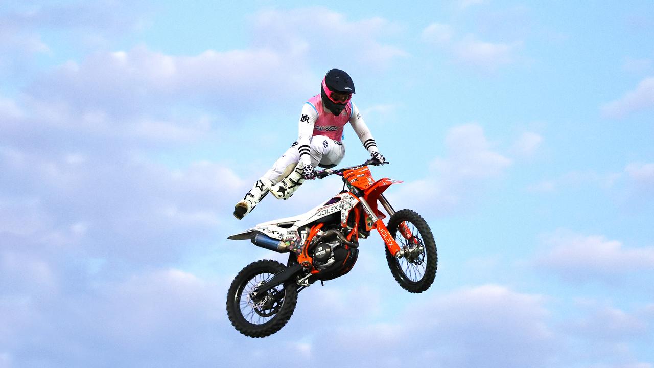 Chevy Olexienko gets both feet over his motocross bike at the 2024 Cairns Bull Throttle event, a bikes and bulls show, featuring bull riding and freestyle motocross riders at the Cairns Showgrounds. Picture: Brendan Radke