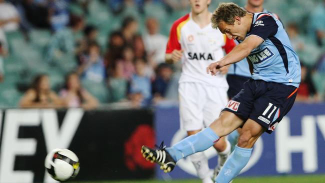 Brendon Santalab shoots and scores for Sydney FC in 2008. P