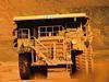  A truck works at the BHP Billiton iron ore mine at Mt Whaleback at Newman in the Pilbara, in undated image released 24/08/05...