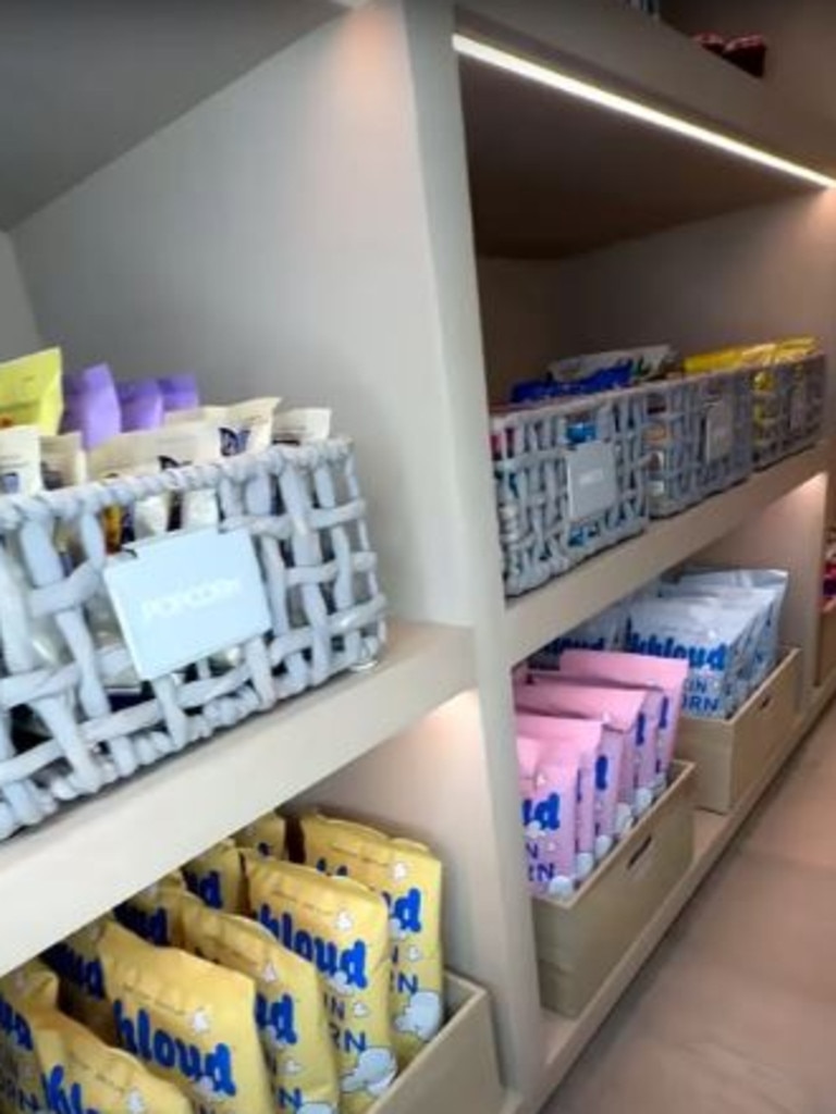 The bottom shelves are filled with her new Khloud popcorn. Picture: Khloé Kardashian/YouTube