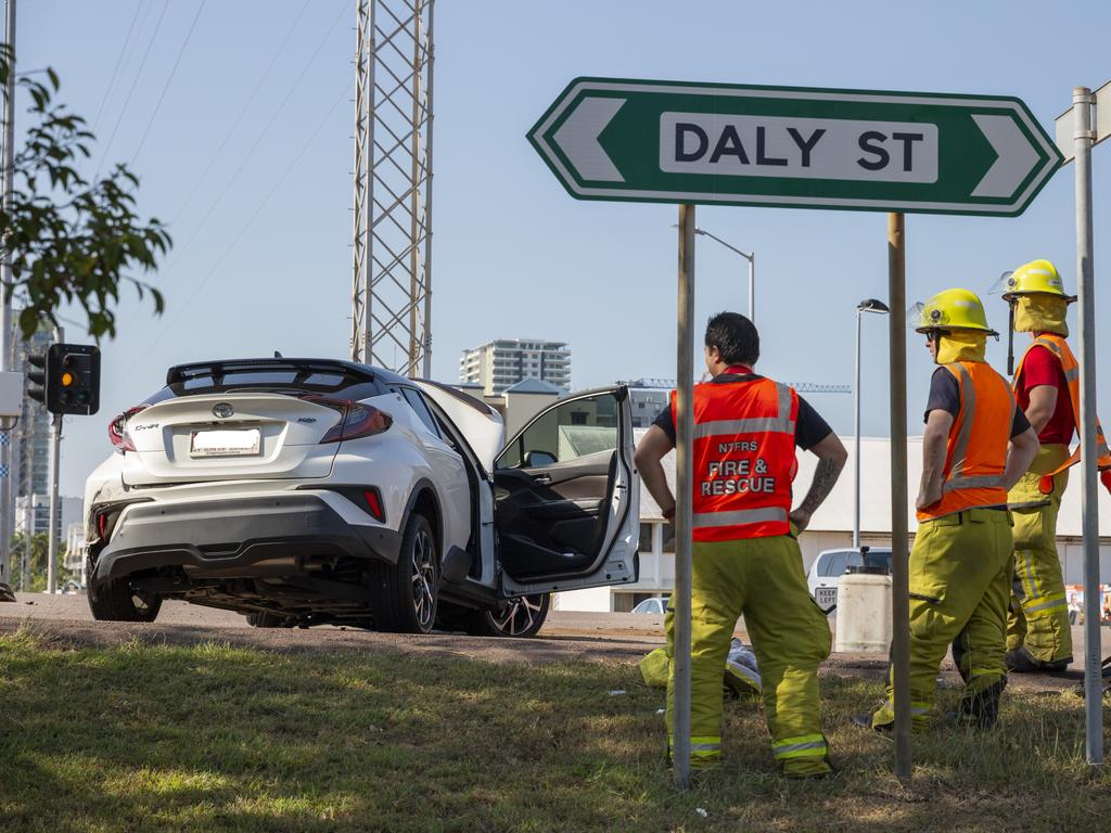 A Toyota Rav has been left mangled after an allegedly stolen Isuzu ute crashed into it at a bust Darwin CBD intersection. Picture: Floss Adams.