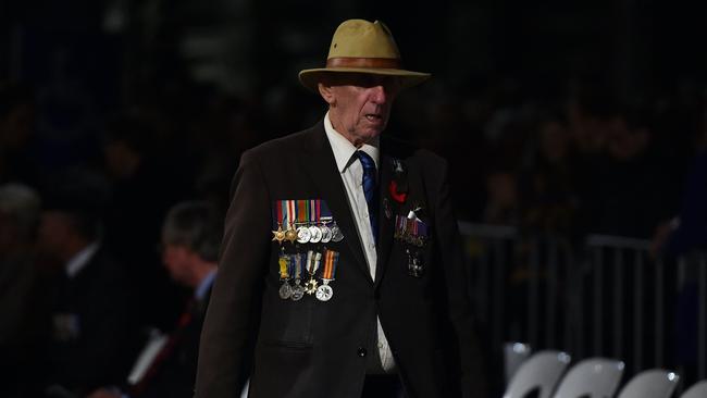 A veteran arrives to attend the Martin Place dawn service this morning.