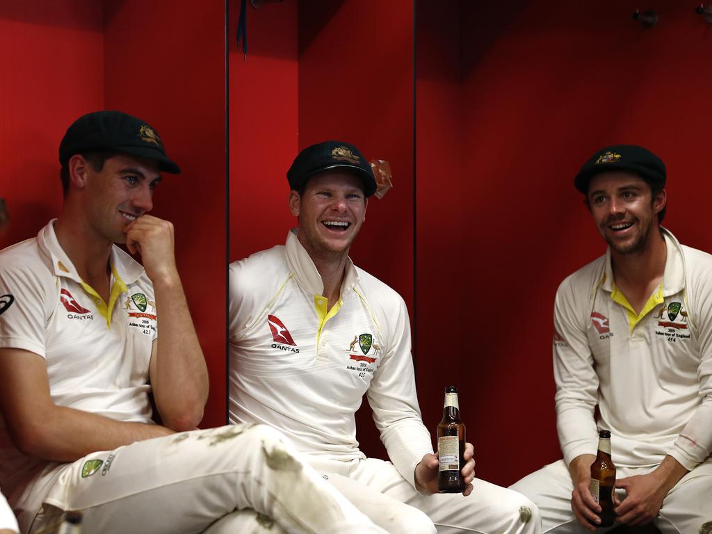 MANCHESTER, ENGLAND - SEPTEMBER 08: Pat Cummins, Steve Smith, Travis Head of Australia celebrate in the change rooms after Australia claimed victory to retain the Ashes during day five of the 4th Specsavers Test between England and Australia at Old Trafford on September 08, 2019 in Manchester, England. (Photo by Ryan Pierse/Getty Images)