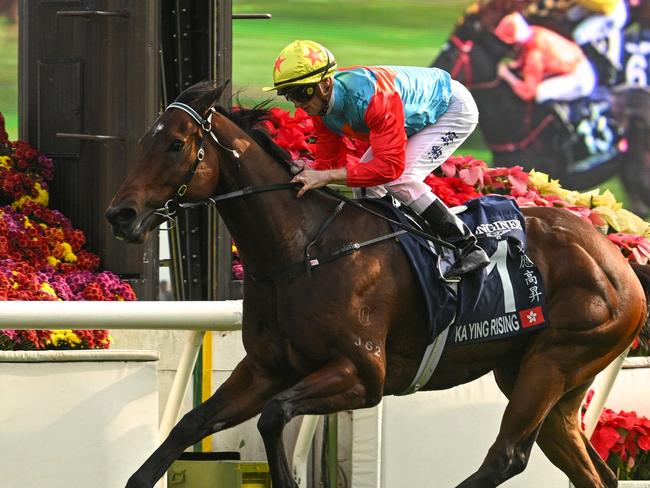 HONG KONG, CHINA - DECEMBER 08: Zac Purton riding Ka Ying Rising winning Race 5, the Longines Hong Kong Sprint during racing at Sha Tin Racecourse on December 08, 2024 in Hong Kong, China.  (Photo by Vince Caligiuri/Getty Images)