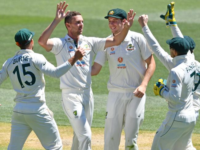 ADELAIDE, AUSTRALIA - DECEMBER 19:Josh Hazelwood of Australia celebrates the wicket ofAjinkya Rahane of India 2 during day three of the First Test match between Australia and India at Adelaide Oval on December 19, 2020 in Adelaide, Australia. (Photo by Mark Brake - CA/Cricket Australia via Getty Images)