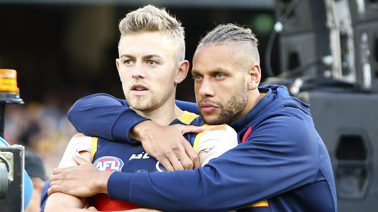 AFL - Grand Final - Adelaide Crows v Richmond Tigers at the MCG. Hugh Greenwood and injured Crow Cam Ellis-Yolmen. Picture Sarah Reed