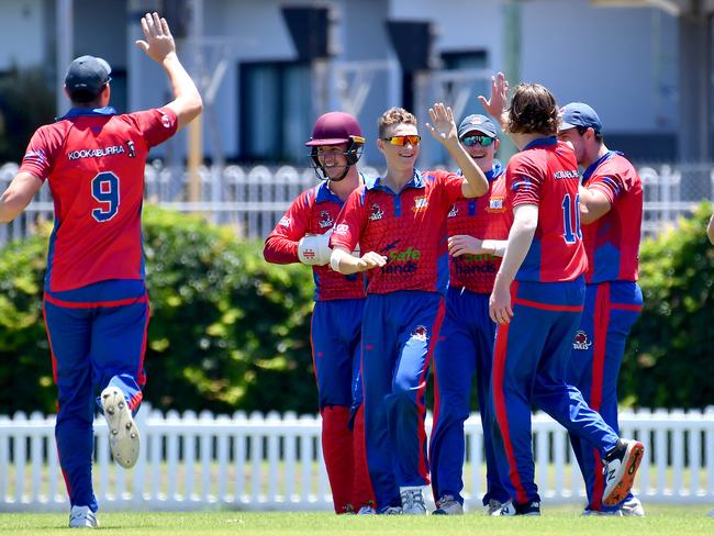 Toombul players celebrate a wicket.T20 club cricket - Toombul v Sandgate RedcliffeSaturday December 4, 2021. Picture, John Gass