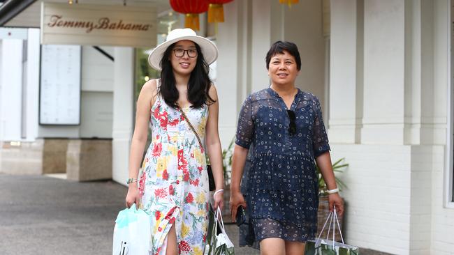 Chinese visitors to Cairns are spending more money than tourists from any other country. Qin Mei Yu and her mother Hong Yu are visiting Cairns for the first time, and buying goods which are much dearer in China. PICTURE: BRENDAN RADKE