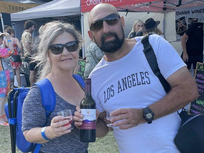 Peter Skapa and Lisa O'brien sampling Moffatdale wines at the Fraser Coast Flavours Festival at Seafront Oval on September 1, 2023.