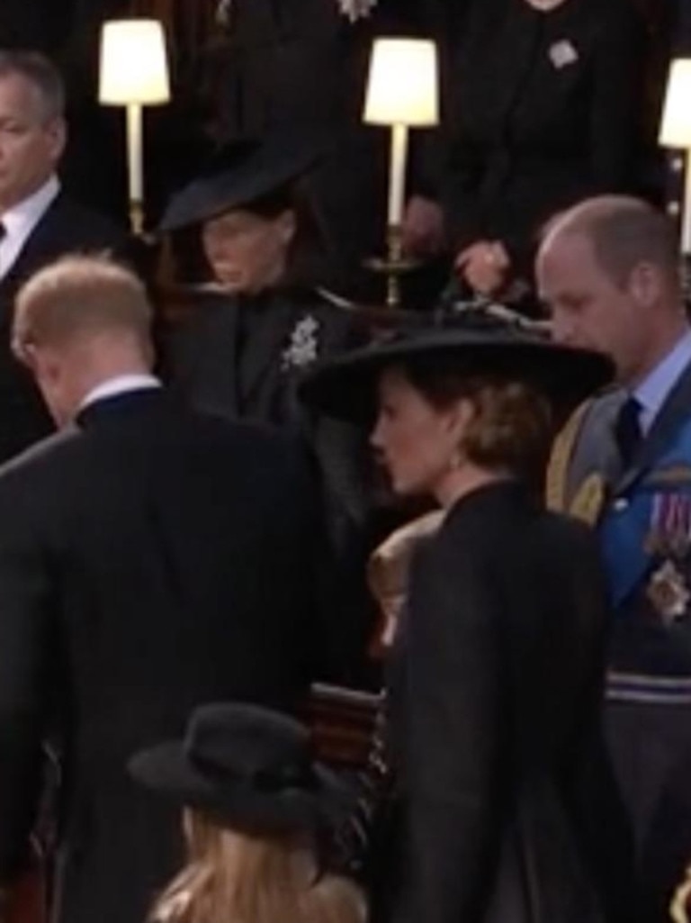 Prince William ushers Prince Harry and Meghan Markle to their seats at Windsor Castle. Picture: Supplied