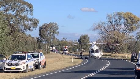 A rescue helicopter was forced to land on the Newell Highway to retrieve Peter Hall after the crash. Picture: Ambulance NSW