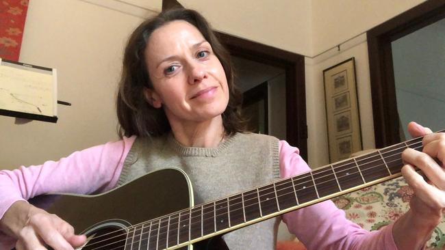 Wentworth's Kate Atkinson learning guitar at home. Pic: Kate Atkinson