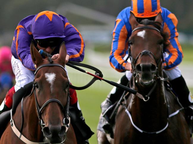 NEWBRIDGE, IRELAND - SEPTEMBER 11:  Frankie Dettori riding Wicklow Brave (L) win The Palmerstown House Estate Irish St Leger from Order Of St George (R) at Curragh racecourse on September 11, 2016 in Newbridge, Ireland. (Photo by Alan Crowhurst/Getty Images)