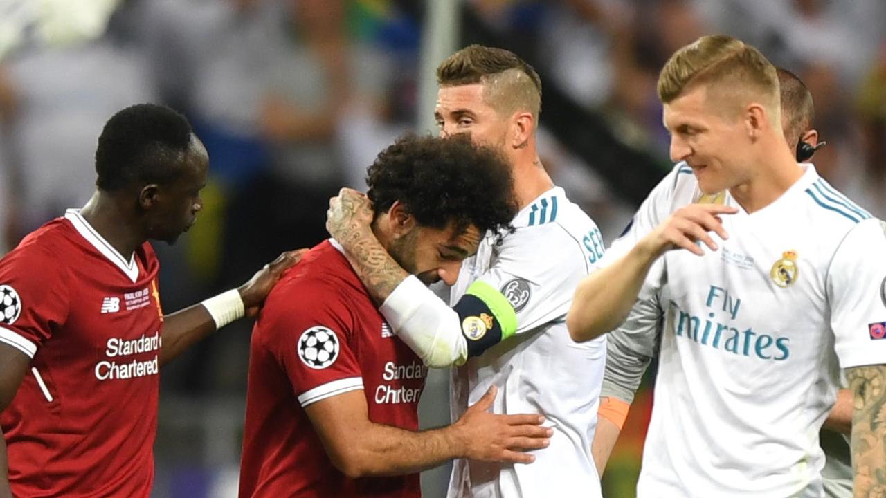 Sergio Ramos consoles Mohamed Salah as he leaves the pitch injured during the UEFA Champions League Final.