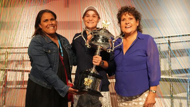 Barty with Evonne Goolagong Cawley, and Cathy Freeman with her trophy. Picture: Getty Images)