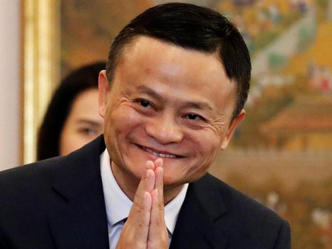 (FILES) In this file photo taken on April 18, 2018, Alibaba founder Jack Ma gestures as he arrives for a meeting with Thailand's Prime Minister Prayuth Chan-ocha in Bangkok  during a visit to the country to announce the group's investment in the Thai government's Eastern Economic Corridor (EEC) scheme. - Alibaba co-founder and chief Jack Ma announced on September 7, 2018 he will leave from the Chinese e-commerce giant on Monday to devote his time to philanthropy focused on education. (Photo by JORGE SILVA / POOL / AFP)