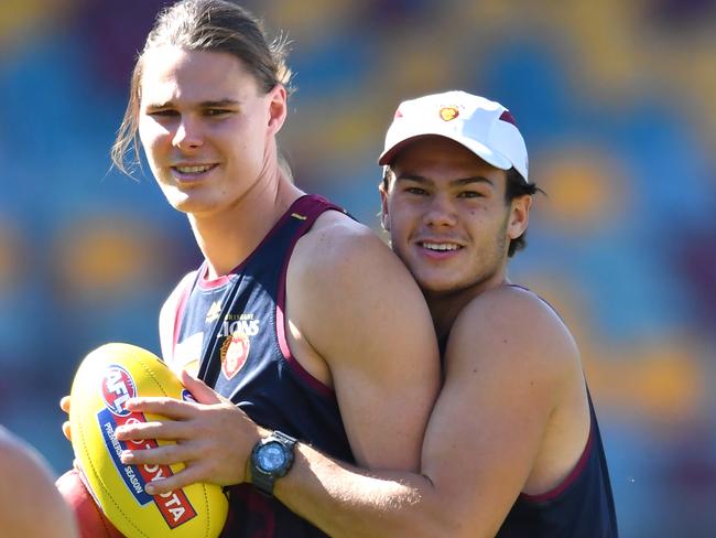 Eric Hipwood (left) and Cam Rayner (right) are seen during Brisbane Lions training at the Gabba in Brisbane, Monday, September 2, 2019. The Lions are playing the Richmond Tigers in the first AFL qualifying final at the Gabba on Saturday night. (AAP Image/Darren England) NO ARCHIVING