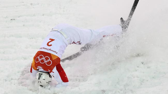 China’s Jia Zongyang crashes during the Olympic men's aerials final at Phoenix Snow Park.