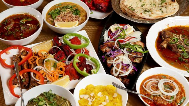 Some of the Pakistani dishes from Lahori Dhaba in Punchbowl. <br/>Top row from L-R; beef nihari, haleem, garlic naan<br/>Middle row; tandoori chicken and shish kebab, chicken malai bodi, lamb shank nihari<br/>Bottom row; saag, halwa, lahori chani<br/>Picture: Jonathan Ng