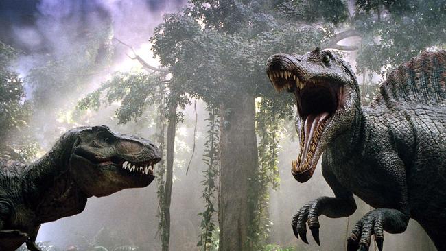 A Tyrannosaurus Rex and a Spinosaurus fight for first choice of humans in <i>Jurassic Park III</i>.