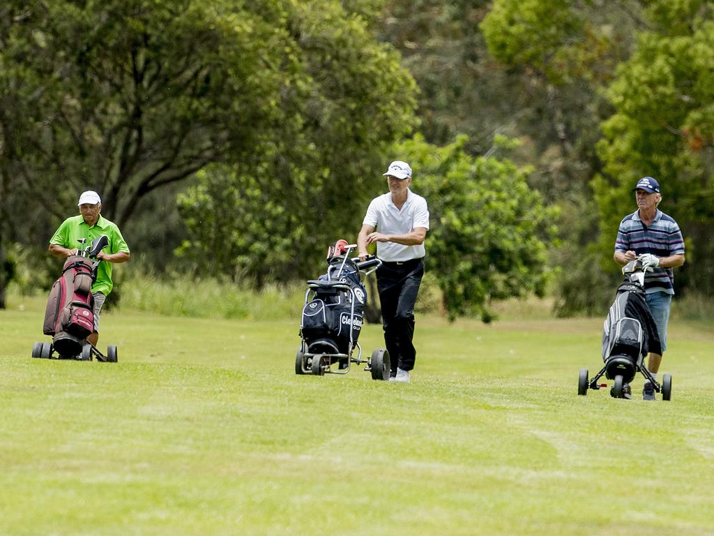 Jimi Pari, Kevin Fellows, Steve Quinlivan playing at the reopened Helensvale Golf Club. Picture: Jerad Williams