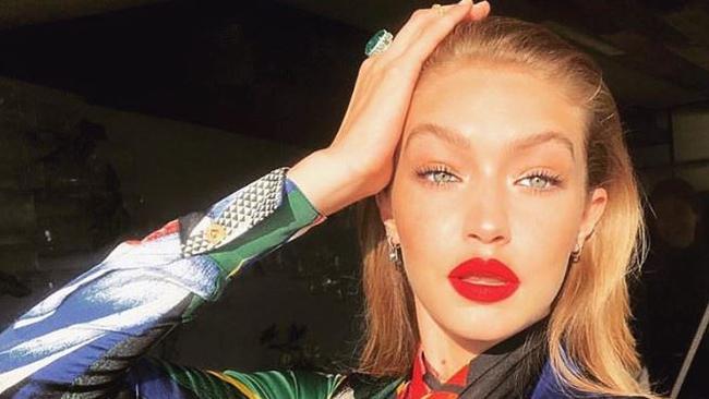 Model Gigi Hadid doing the "migraine pose" on Instagram.