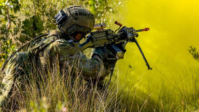 An Australian Army soldier from 11th Brigade during an assault on an 'enemy' defensive position at Cowley Beach training area in northern Queensland during Exercise Austral Shield 2024. Picture: CPL Michael Currie.