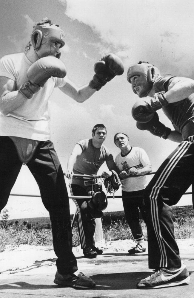 Ces watches on his sons Dean, Guy and Troy Waters spar together.