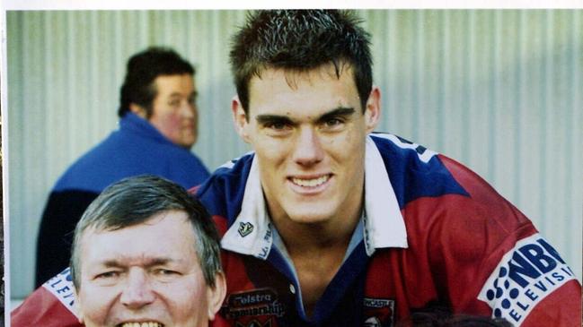 UNDATED : Newcastle Knights NRL player John Morris in undated copy photo with his father John and Mum Sharyn on his 21st birthday, the day he played his first grade debut. Morr/fam Rugby League