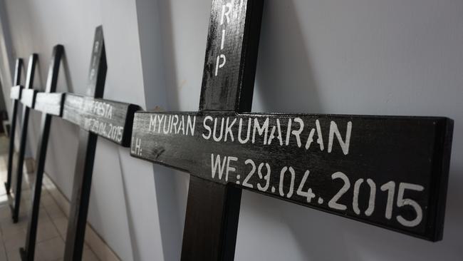 Crosses for the condemned, in the foreground Myuran Sukumaran’s painted with his date of death.